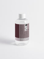 Close-up of clear exfoliating toner texture by Suvera