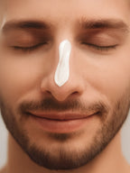 Close-up of a man with cream on his nose against a neutral background Nourishing Rich Cream, Fragrance Free