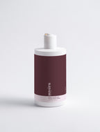 Minimalist haircare flatlay – Gloss Conditioner for dry ends