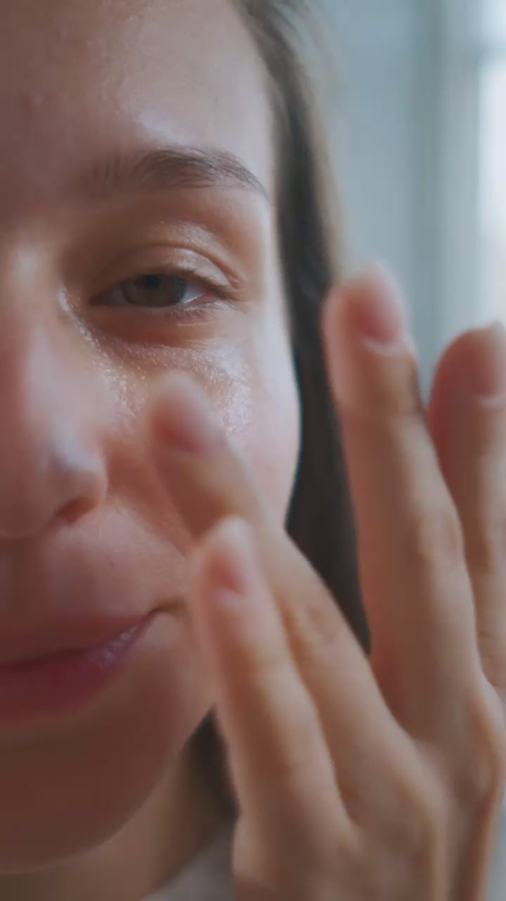 Model Suvera Self Care applying Antioxidant Ginkgo Gel Booster on her face eyes